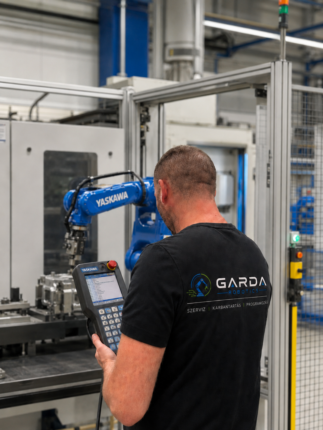 Yaskawa Roboterprogrammierung mit Teach Pendant in industrieller Umgebung